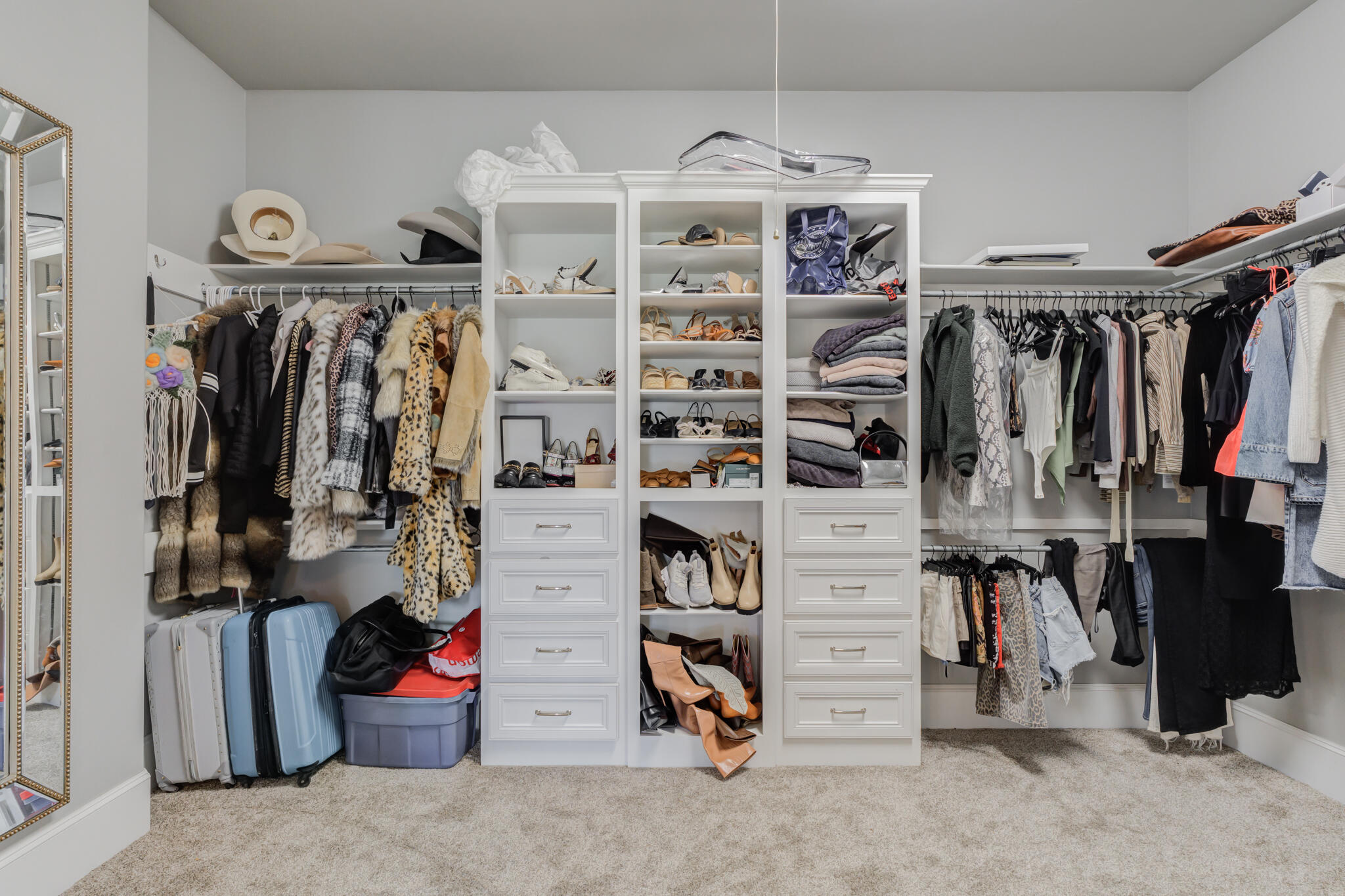 8917 County Road 6870 Lubbock, TX 79407 - Photo 27 of 53 a view of walk in closet with clothes and shoes