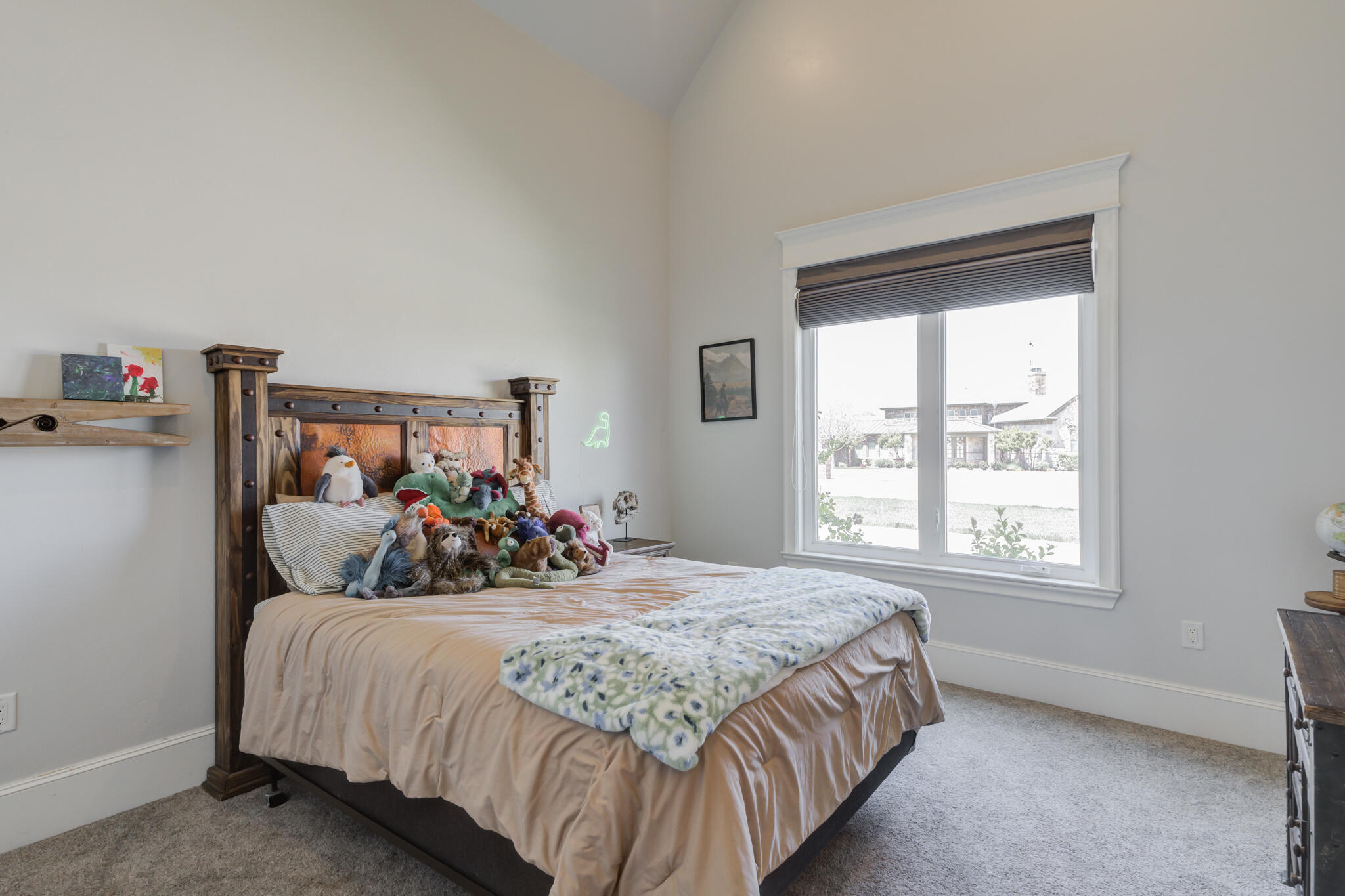 8917 County Road 6870 Lubbock, TX 79407 - Photo 32 of 53 a bedroom with a bed and walk in closet
