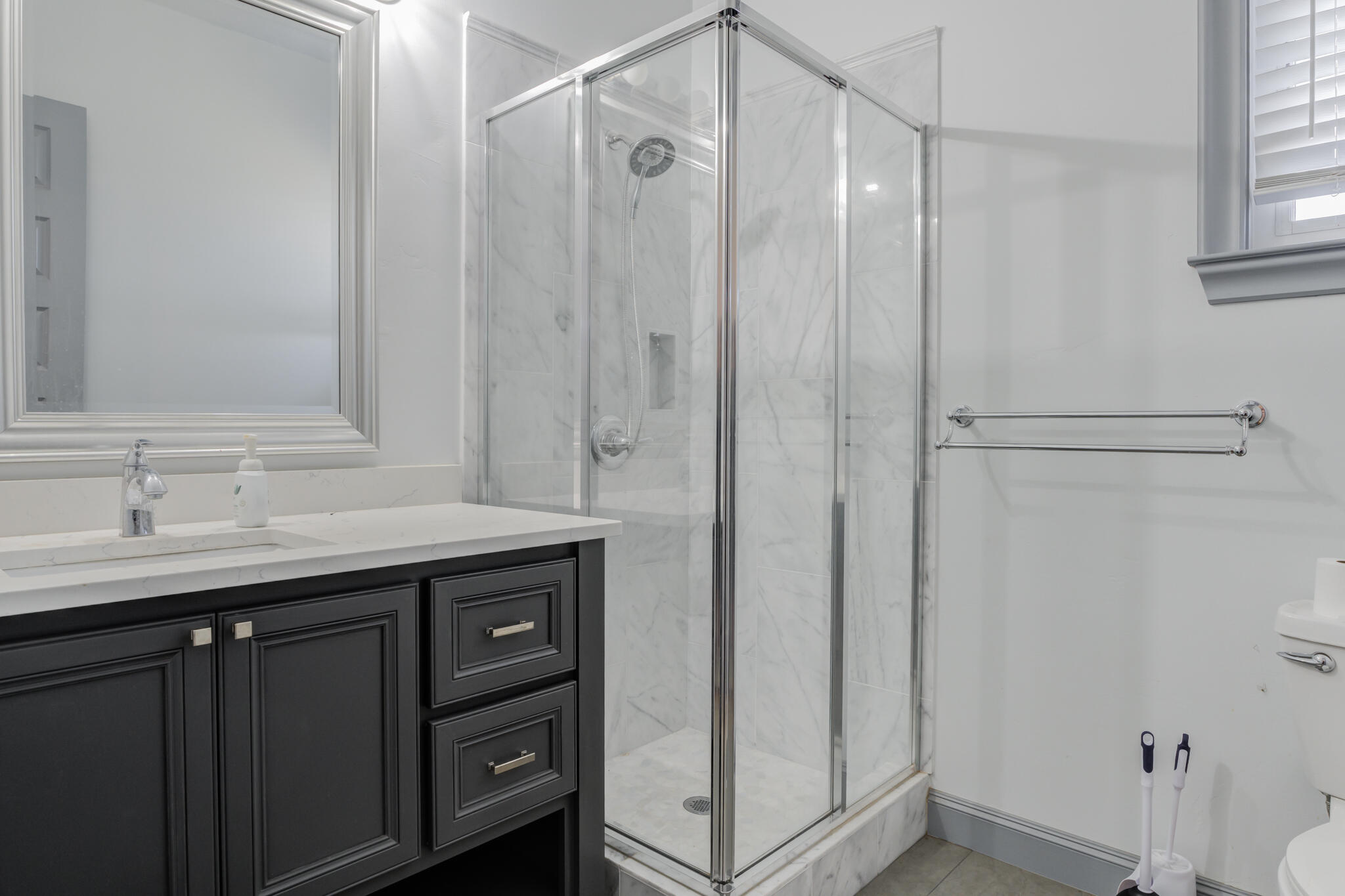 8917 County Road 6870 Lubbock, TX 79407 - Photo 51 of 53 a bathroom with a granite countertop sink mirror and double