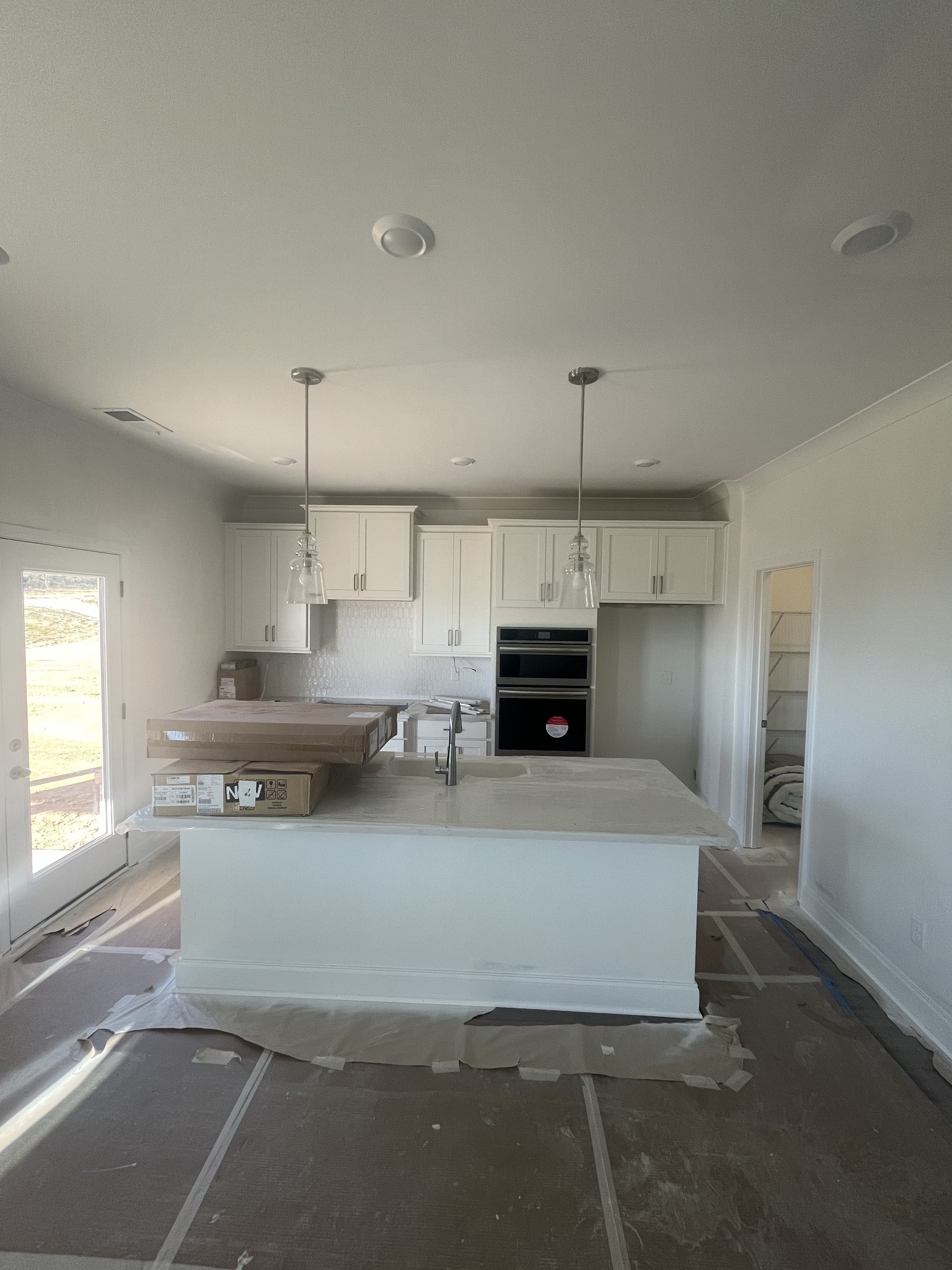 3123 Arbor Valley Rd Spring Hill Spring Hill, TN 37174 - Photo 8 of 13 a large kitchen with stainless steel appliances a large counter top space a sink and a window