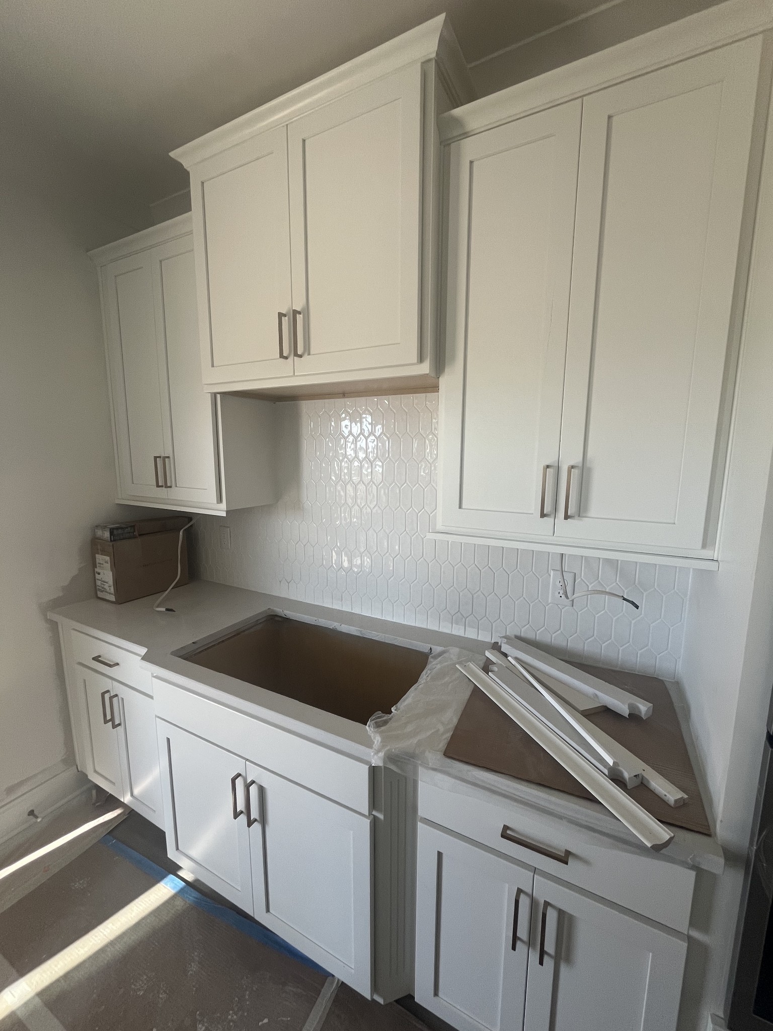 3123 Arbor Valley Rd Spring Hill Spring Hill, TN 37174 - Photo 9 of 13 a kitchen with white cabinets and white appliances