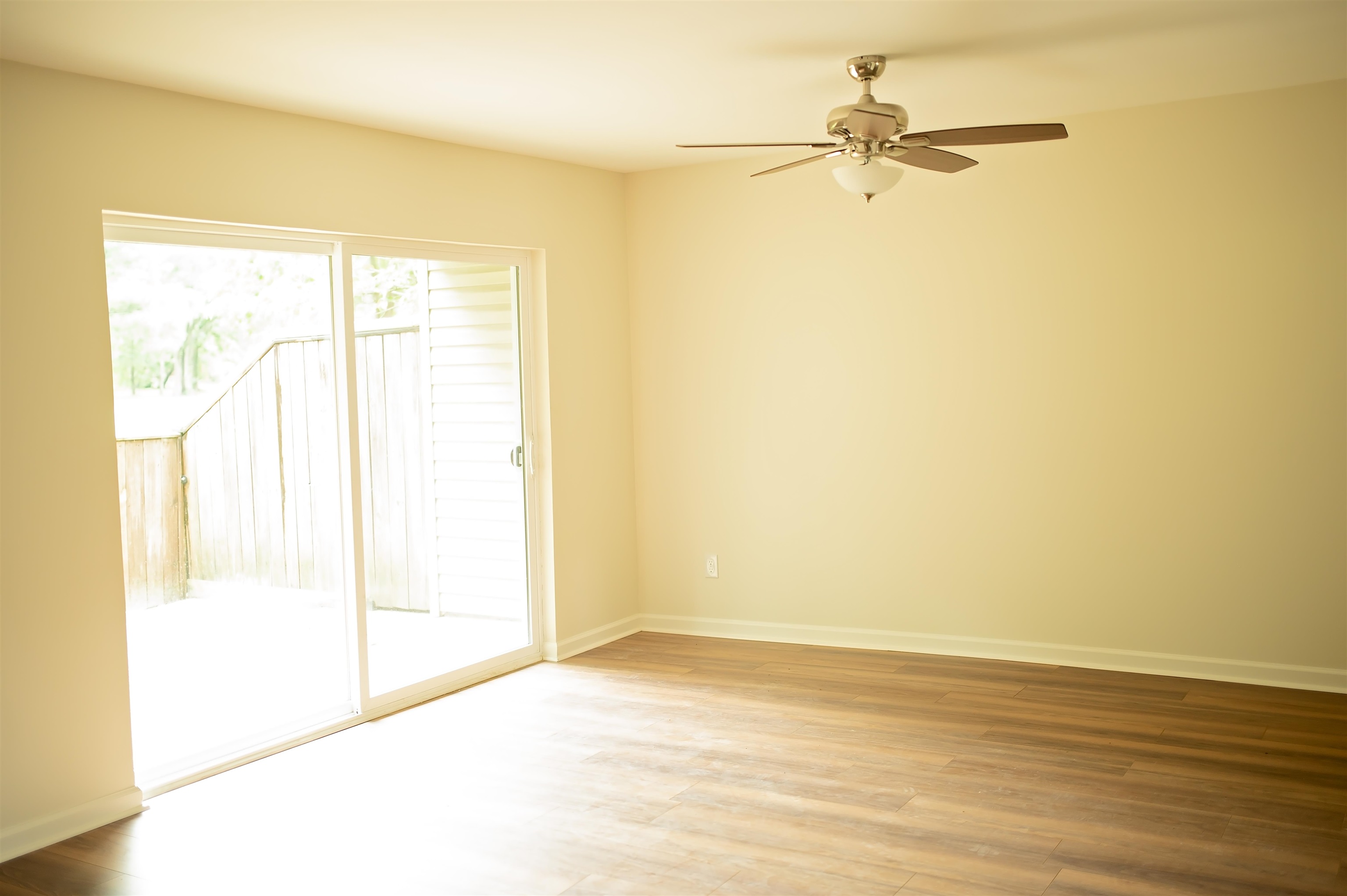 3102 Rising Sun Road, Unit 59 Lakeland, TN 38002 - Photo 9 of 27 a view of an empty room with a window