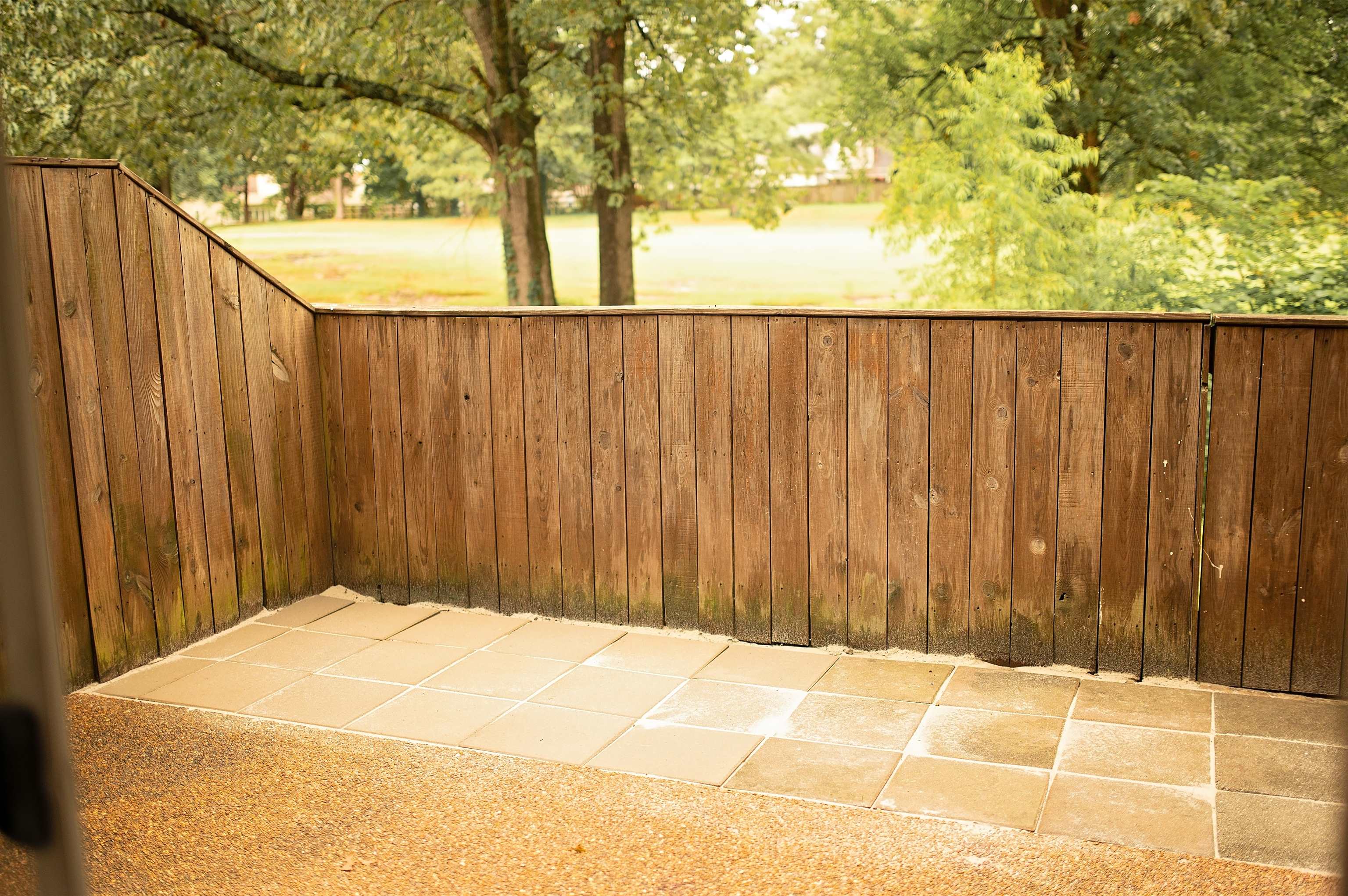 3102 Rising Sun Road, Unit 59 Lakeland, TN 38002 - Photo 10 of 27 a view of a wooden fence