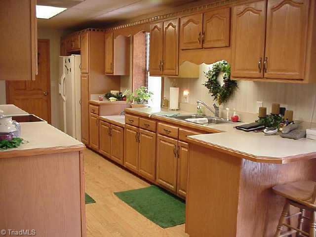 5909 Monnett Road Julian, NC 27283 - Photo 6 of 9 Other. Kitchen on level