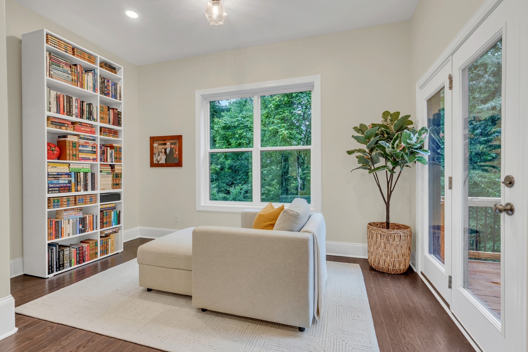 8040 Still Spg Rdg Drive Nashville, TN 37221 - Photo 11 of 38 a living room with furniture and a potted plant