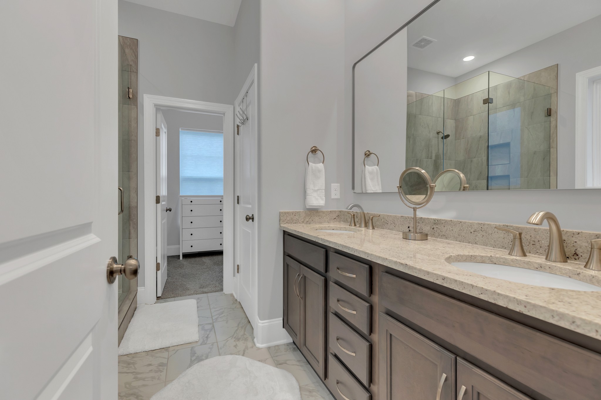 8040 Still Spg Rdg Drive Nashville, TN 37221 - Photo 14 of 38 a en suite bathroom with a granite countertop sink mirror and double