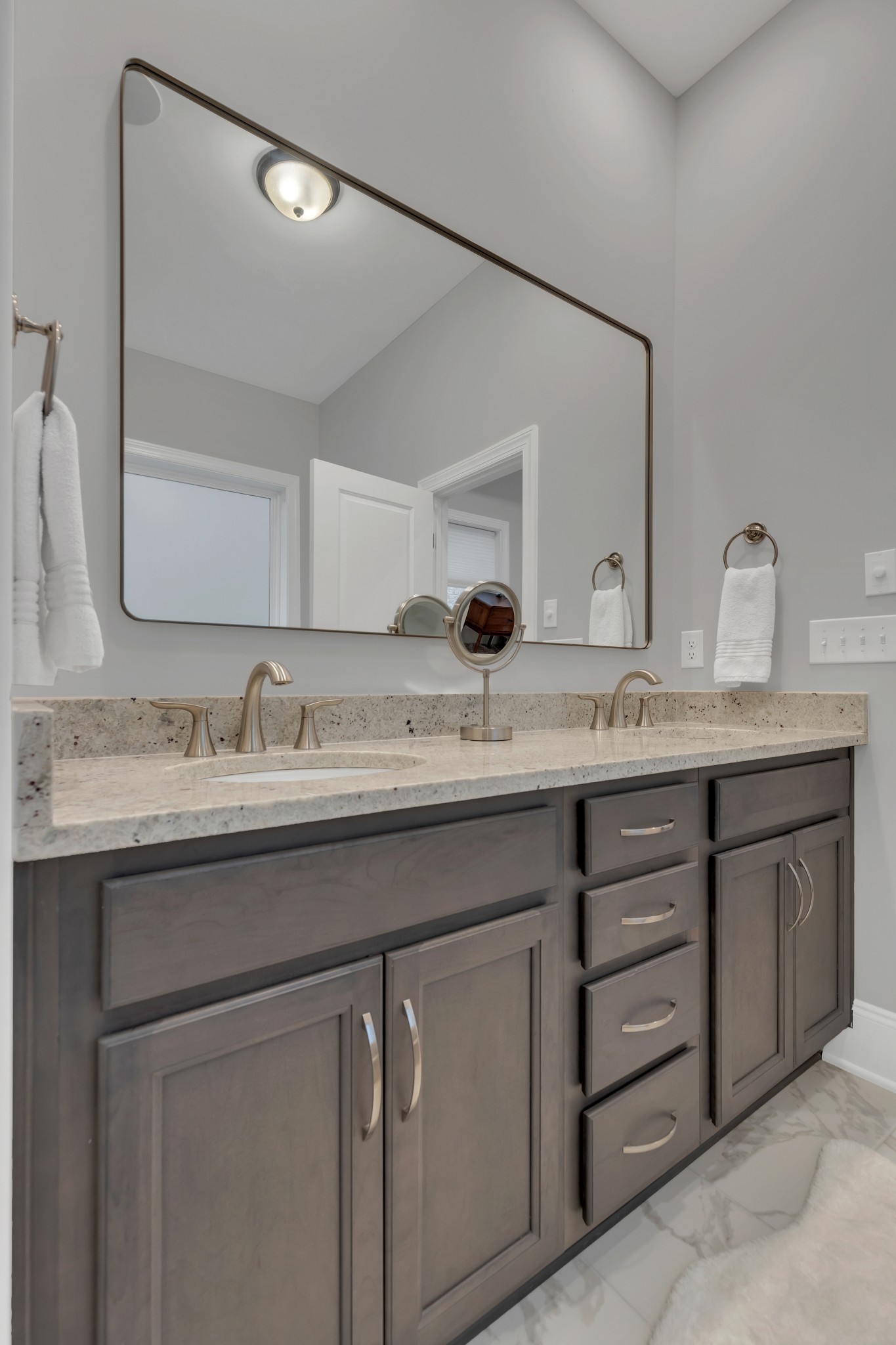 8040 Still Spg Rdg Drive Nashville, TN 37221 - Photo 15 of 38 a bathroom with a granite countertop sink and a mirror