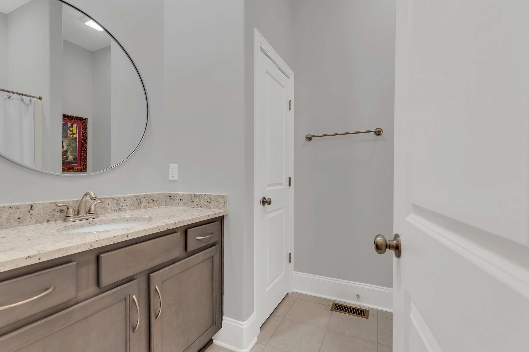8040 Still Spg Rdg Drive Nashville, TN 37221 - Photo 22 of 38 a bathroom with a sink and a mirror