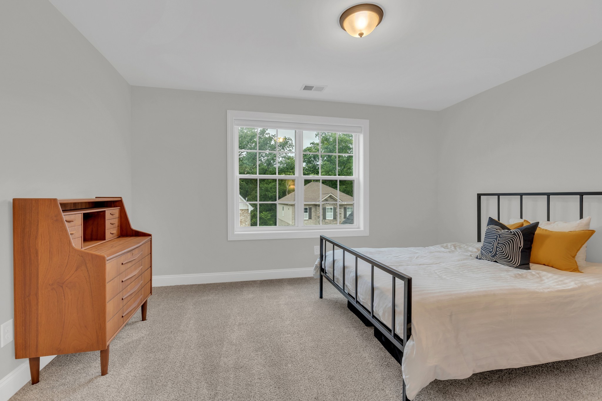 8040 Still Spg Rdg Drive Nashville, TN 37221 - Photo 28 of 38 a bedroom with a bed and a window