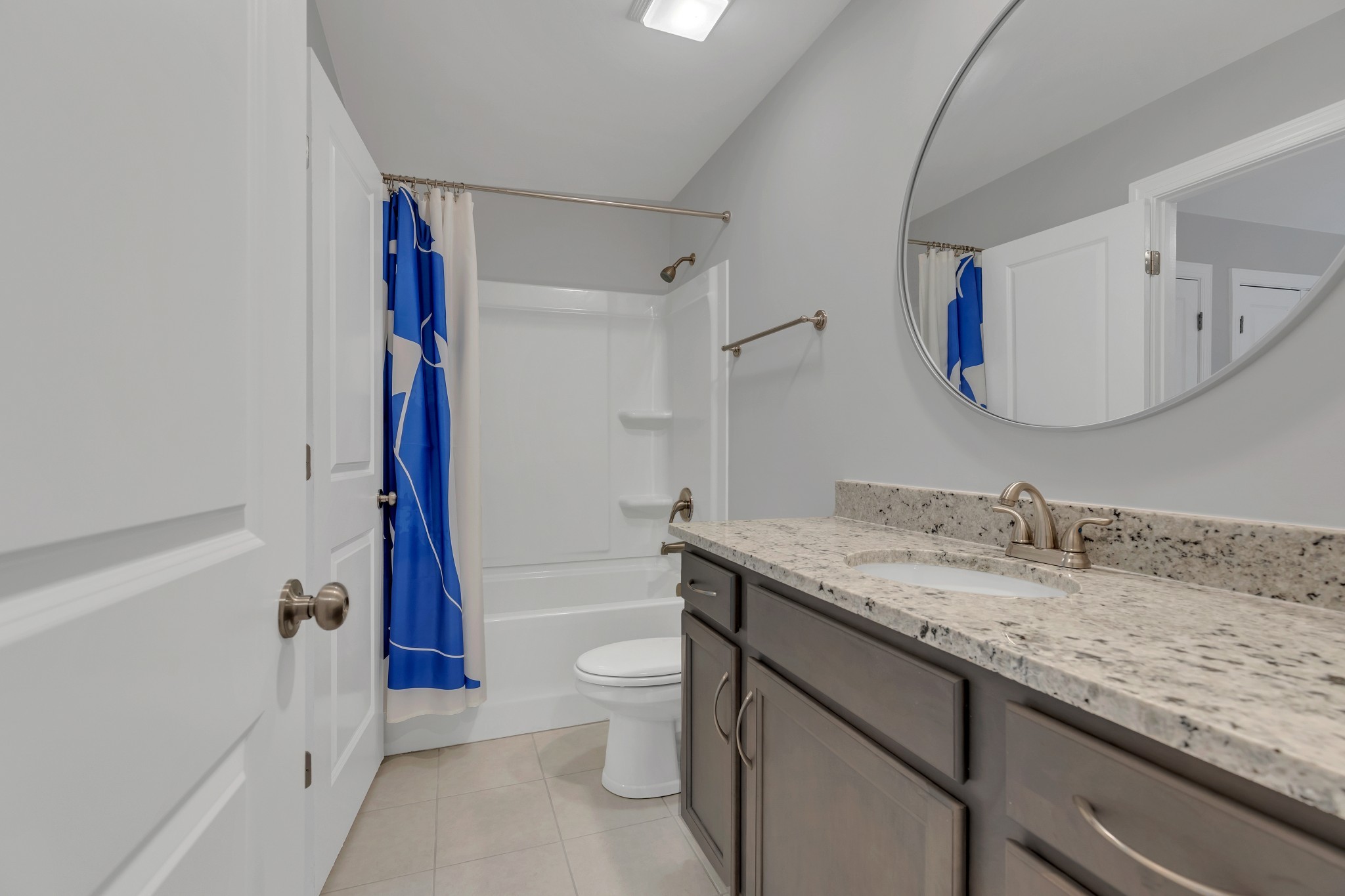 8040 Still Spg Rdg Drive Nashville, TN 37221 - Photo 31 of 38 a bathroom with a granite countertop sink toilet and shower