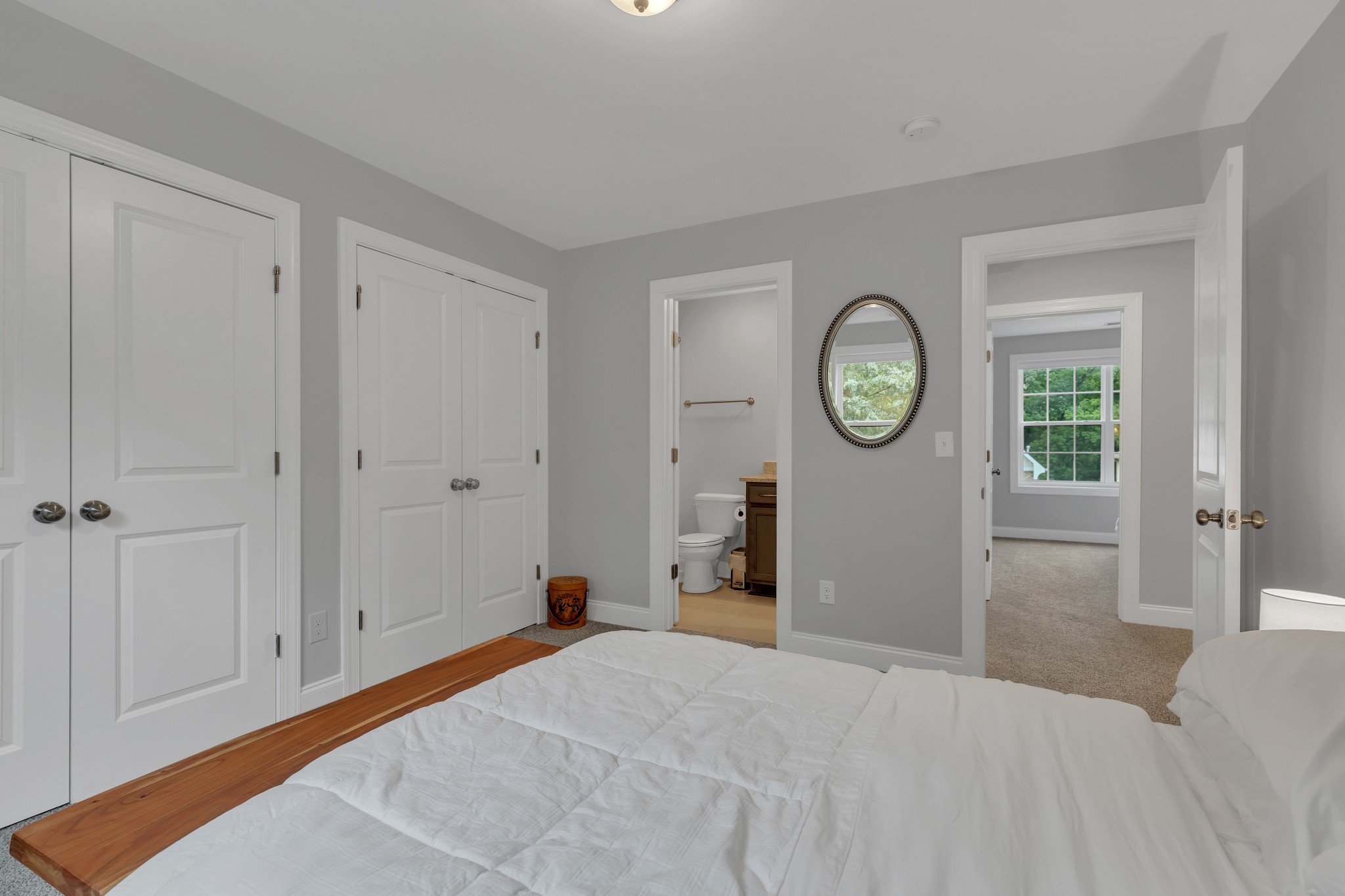 8040 Still Spg Rdg Drive Nashville, TN 37221 - Photo 33 of 38 a bedroom with a large bed and a closet
