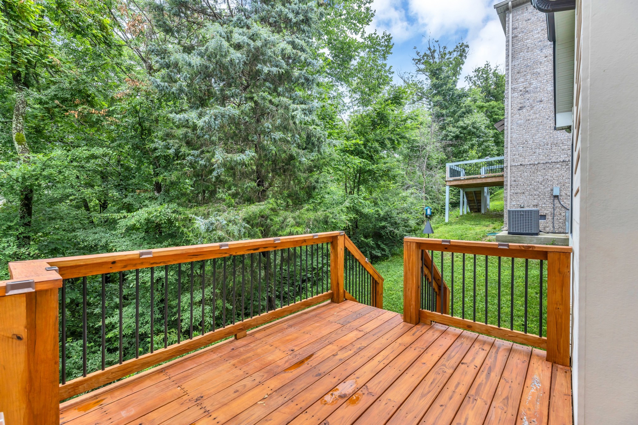 8040 Still Spg Rdg Drive Nashville, TN 37221 - Photo 34 of 38 a view of balcony with wooden floor