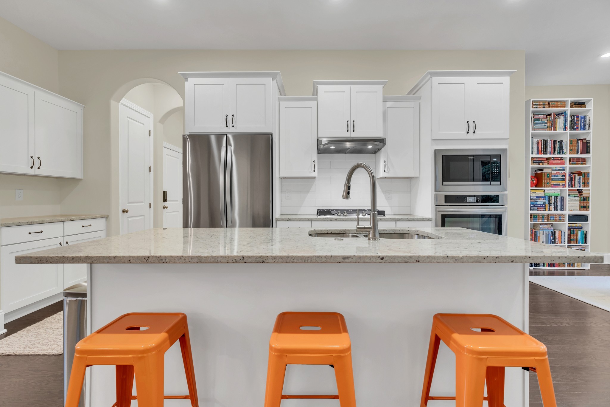 8040 Still Spg Rdg Drive Nashville, TN 37221 - Photo 10 of 38 a kitchen with stainless steel appliances granite countertop a sink and cabinets
