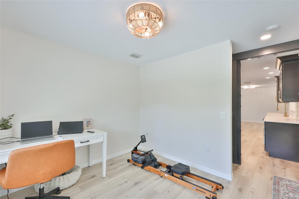 1578 Indian Bay Road Spring Hill, FL 34607 - Photo 22 of 51 a room with a workspace