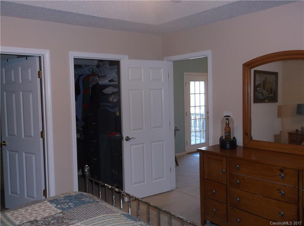 4061 Wycoff Road Sharon, SC 29742 - Photo 16 of 22 a room with two mirror and a dresser