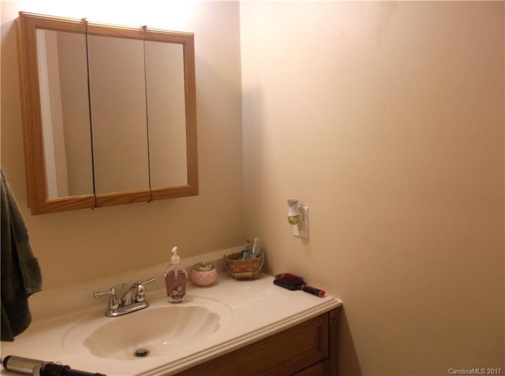 4061 Wycoff Road Sharon, SC 29742 - Photo 19 of 22 a bathroom with a sink and a vanity