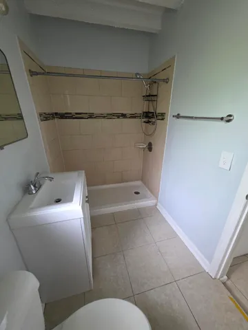 a bathroom with a sink and toilet