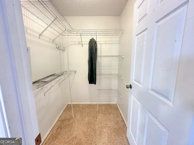 a bathroom with a tub and a shower