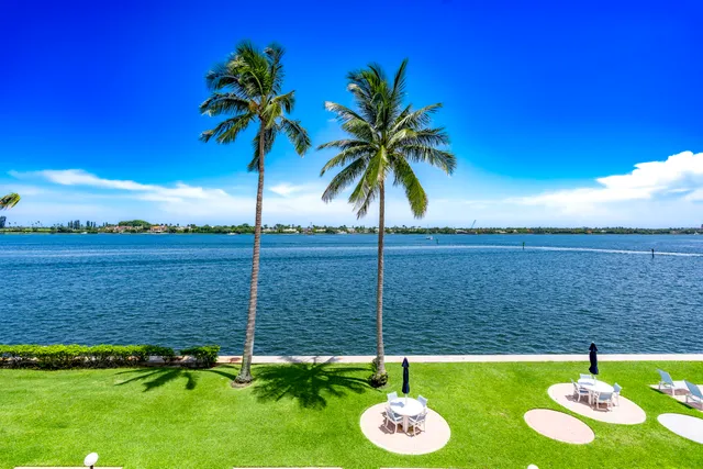 a view of a building with a yard