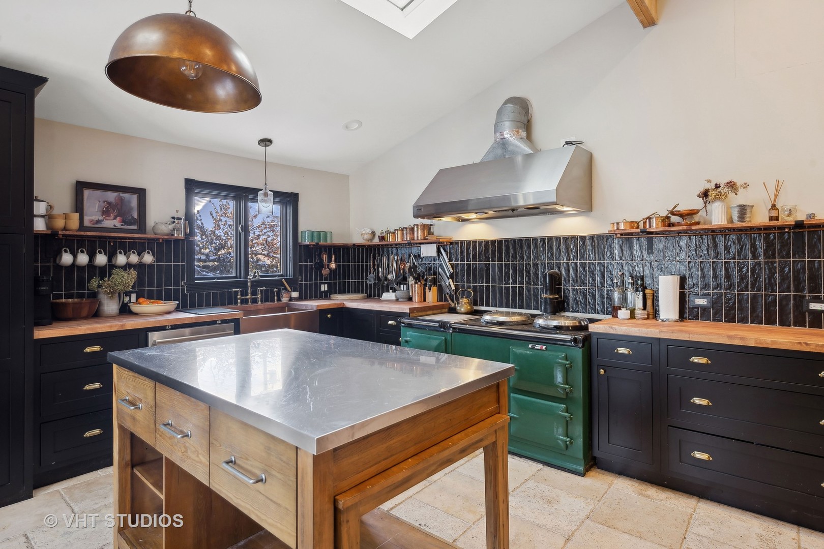 3762 North Harding Avenue Chicago, IL 60618 - Photo 17 of 25 a kitchen with a sink a counter space and stainless steel appliances