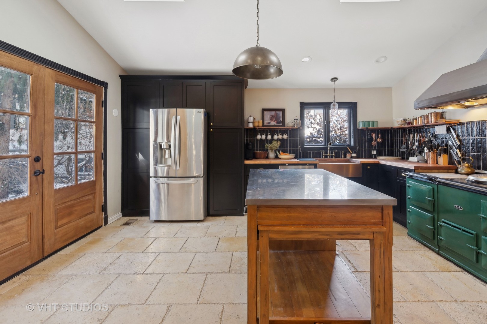 3762 North Harding Avenue Chicago, IL 60618 - Photo 18 of 25 a kitchen with a refrigerator a sink and a stove