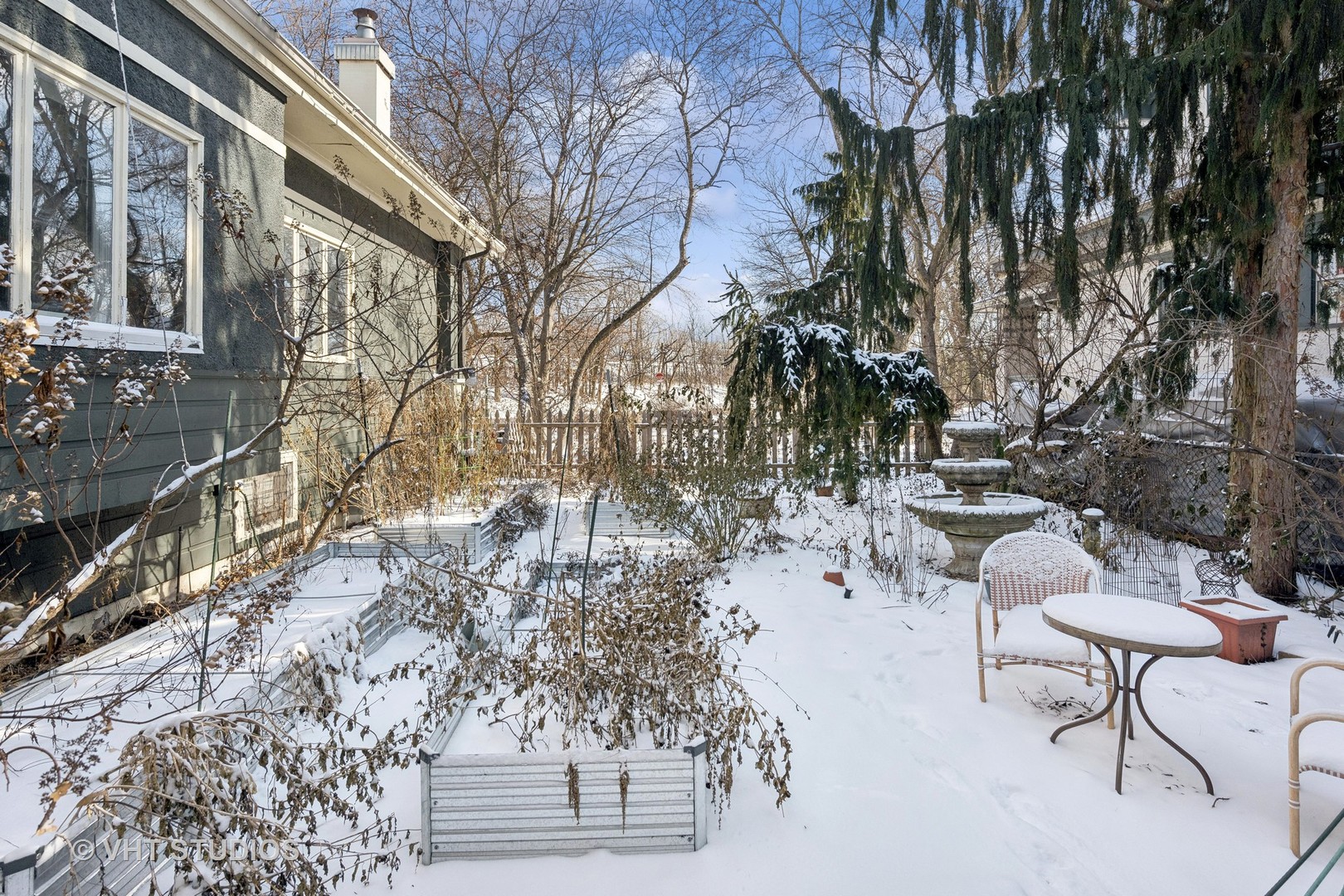 3762 North Harding Avenue Chicago, IL 60618 - Photo 20 of 25 a view of patio with chairs and a table with potted plants