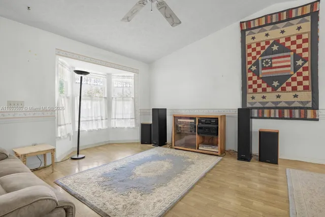a view of a livingroom with furniture and a fireplace