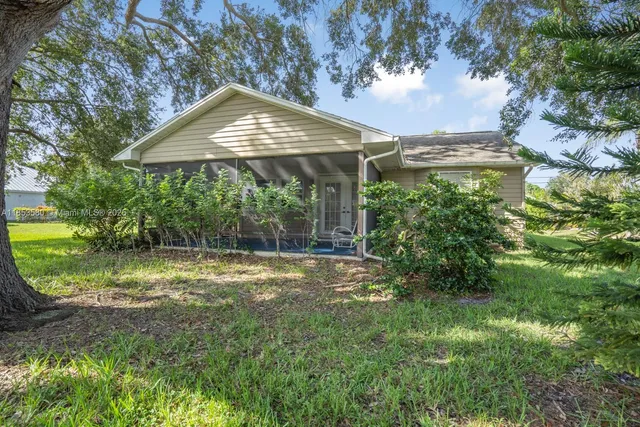 a view of backyard with green space