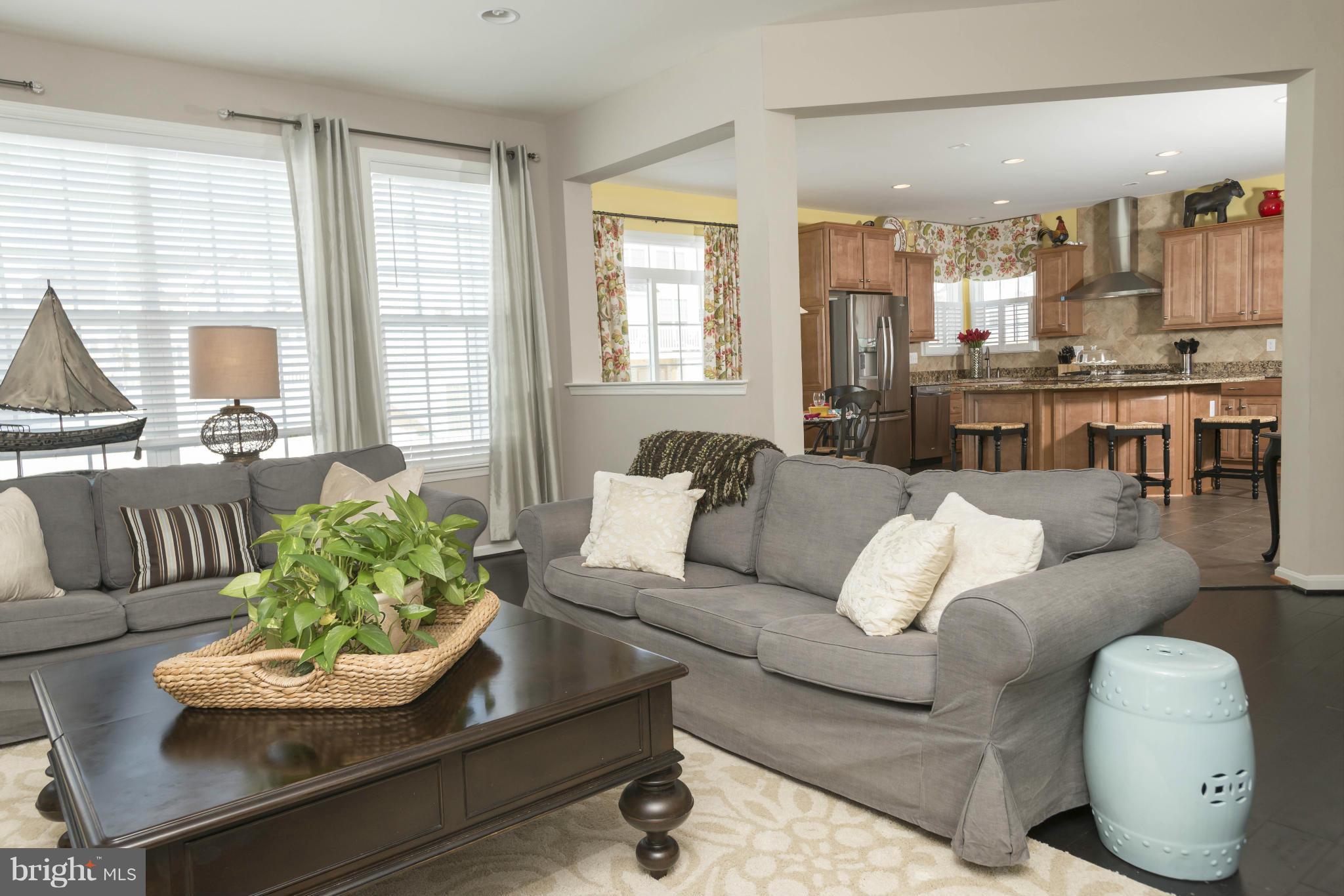 2302 Winterwood Road Baltimore, MD 21209 - Photo 11 of 30 a living room with furniture and a large window