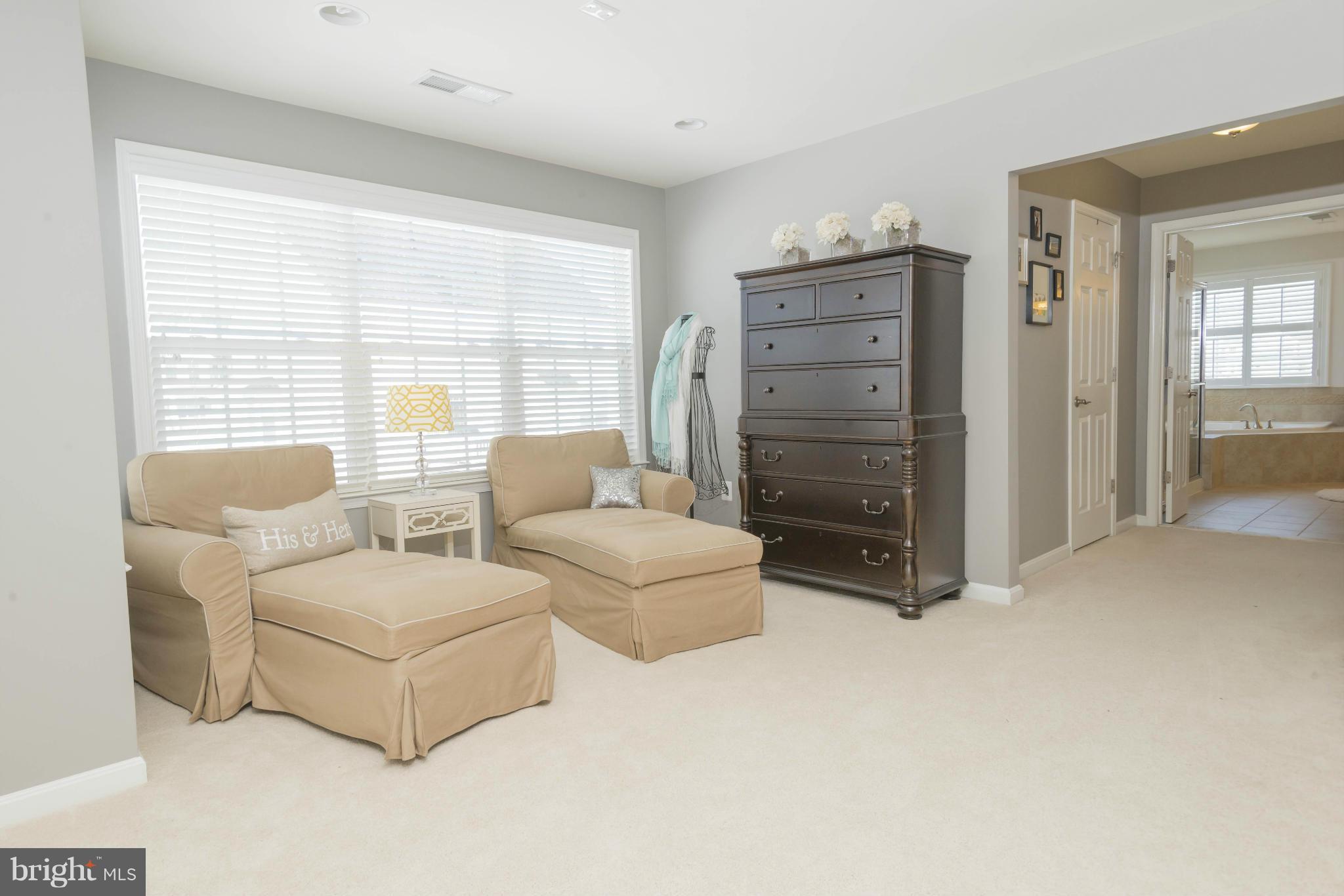 2302 Winterwood Road Baltimore, MD 21209 - Photo 23 of 30 a living room with furniture and a window