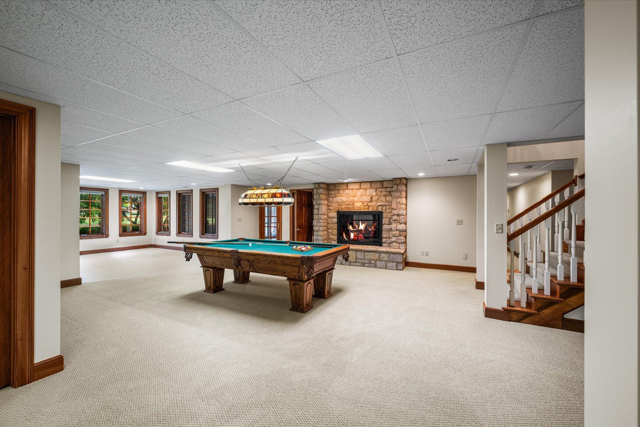 18261 Boerger Road Marysville, OH 43040 - Photo 65 of 94 Basement Rec Room with large family/sun room filled with windows!