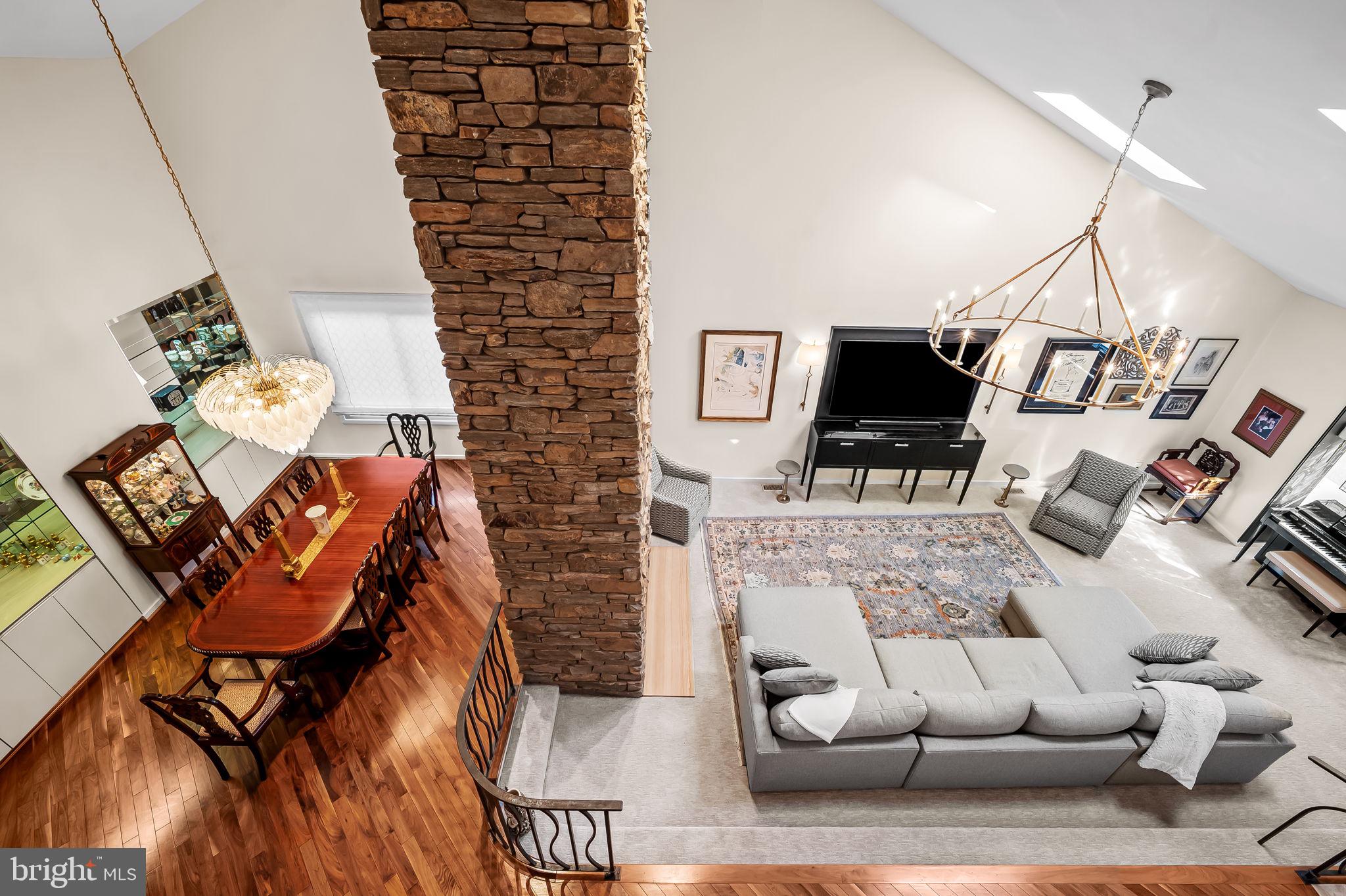 8014 Melody Lane, Unit 8014 Baltimore, MD 21208 - Photo 18 of 51 a living room with furniture and a flat screen tv