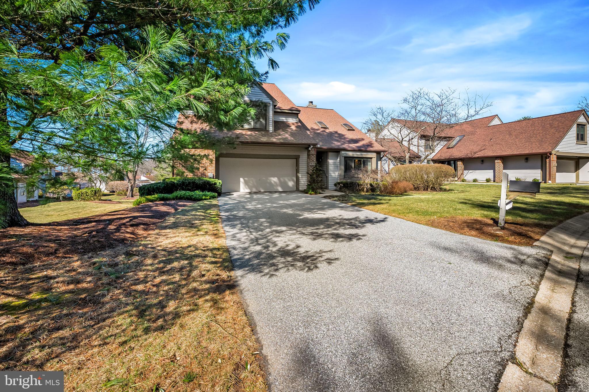 8014 Melody Lane, Unit 8014 Baltimore, MD 21208 - Photo 3 of 51 a view of a house with a yard