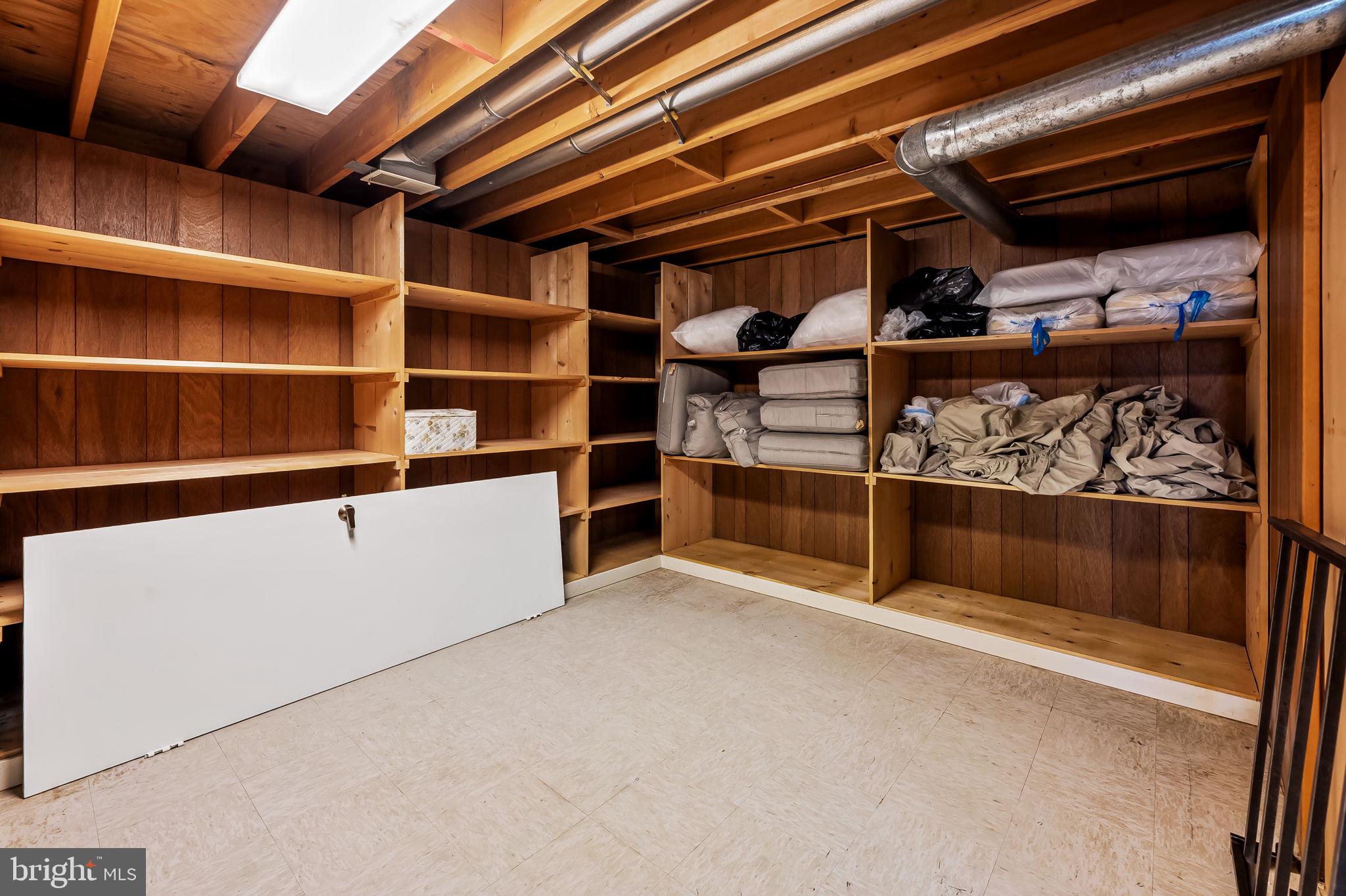 8014 Melody Lane, Unit 8014 Baltimore, MD 21208 - Photo 43 of 51 a view of an empty room with racks