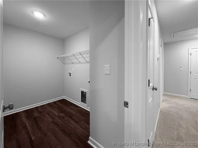 a bathroom with a granite countertop sink and mirror