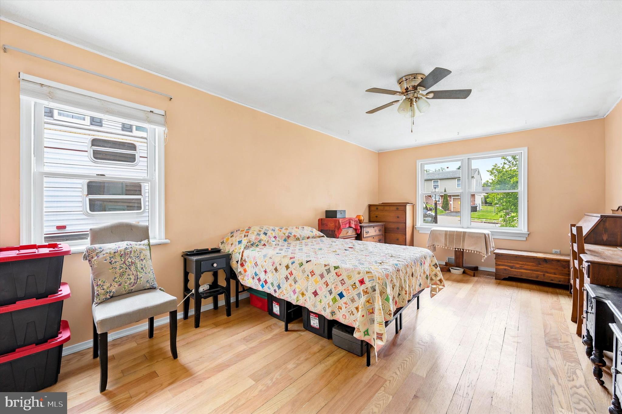 319 Willowbrook Road Upper Chichester, PA 19061 - Photo 12 of 24 a bedroom with a bed a table and chair