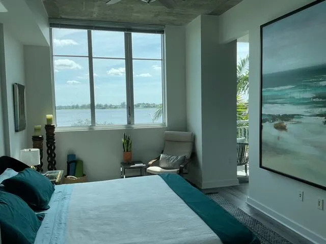 a room with a bed and a window