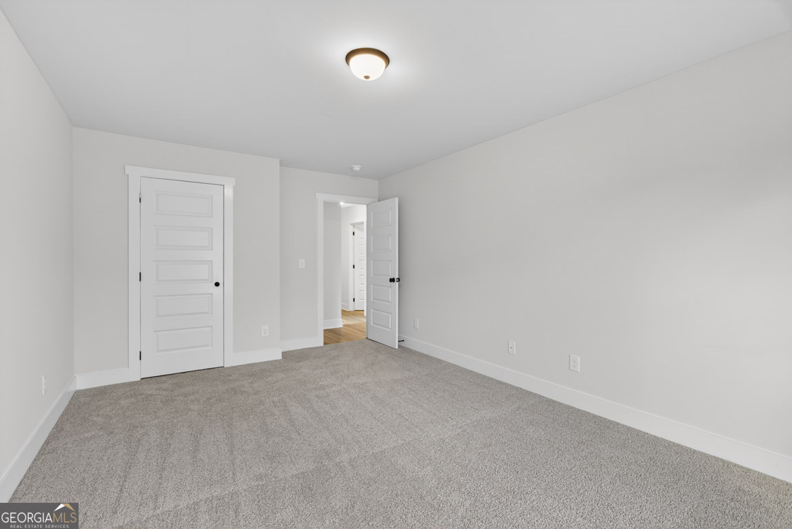 230 Airport Road, Unit 9 Canon, GA 30520 - Photo 23 of 36 a view of an empty room