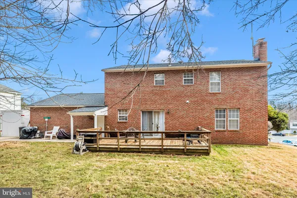 a view of a yard with snow in front of it