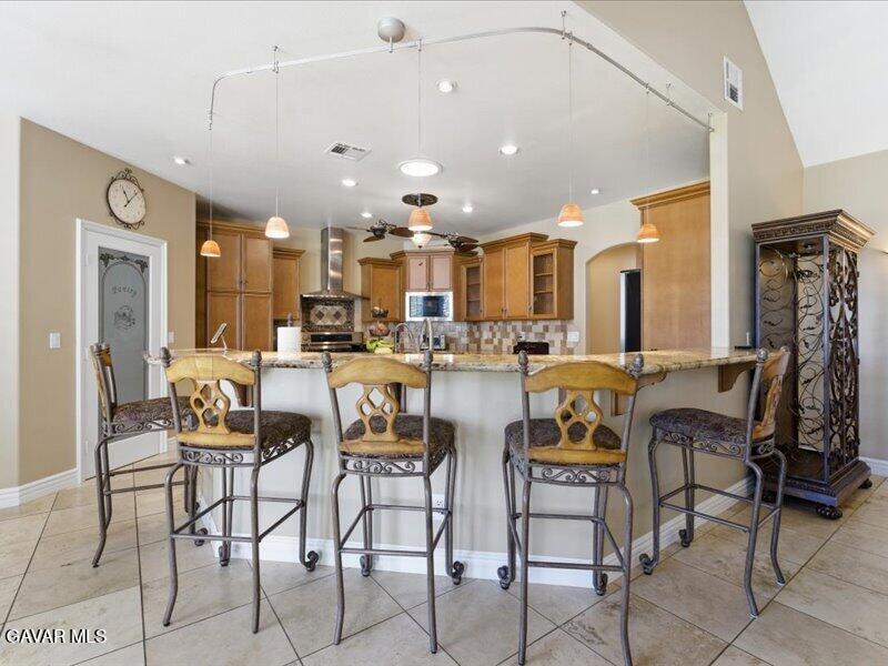 4107 Paddock Way Lancaster, CA 93536 - Photo 11 of 49 a view of a dining area with furniture