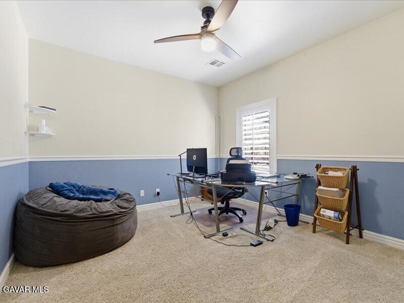 4107 Paddock Way Lancaster, CA 93536 - Photo 17 of 49 a living room with furniture and a piano