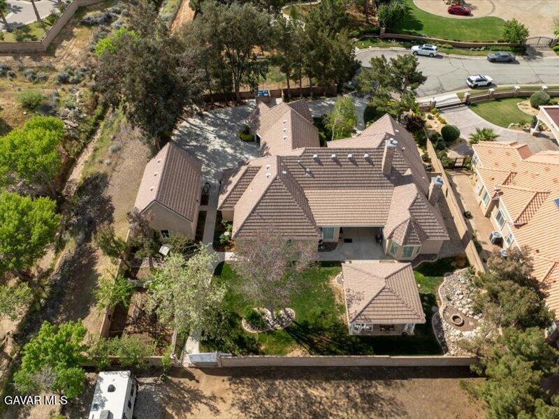4107 Paddock Way Lancaster, CA 93536 - Photo 46 of 49 an aerial view of a house with a yard and lake view