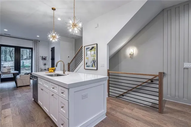 a view of living room and chandelier