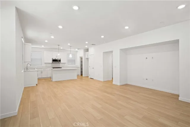 a view of kitchen with wooden floor