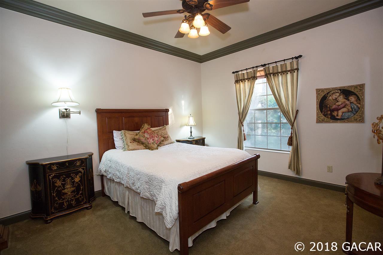 4626 Southwest 97th Terrace Gainesville, FL 32608 - Photo 19 of 30 The secondary bedroom has plenty of space for your guests.