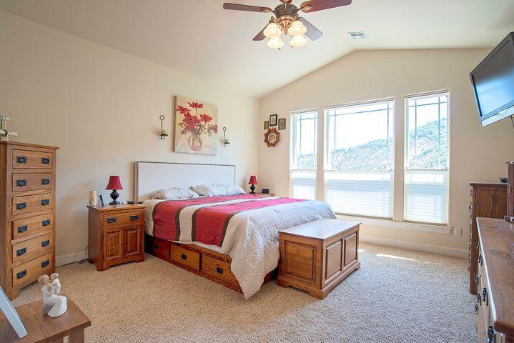 5565 Fishers Ferry Road Gold Hill, OR 97525 - Photo 15 of 26 Large Primary Suite Offers Picture Window Views of the River!