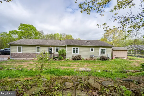 a view of a yard in front of a house