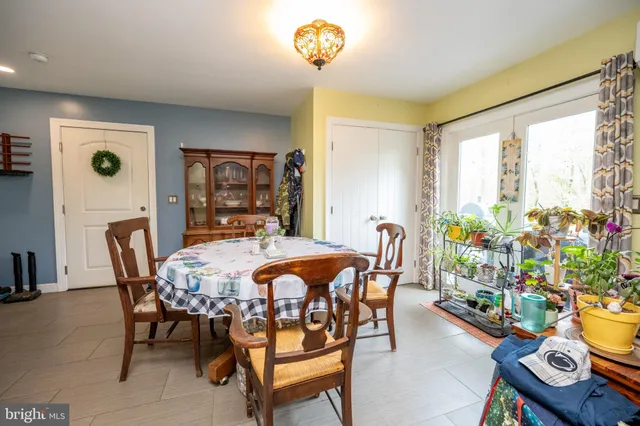 a kitchen with a stove a sink and a refrigerator