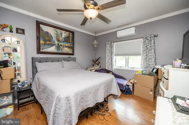 a bathroom with a sink a toilet and shower curtain