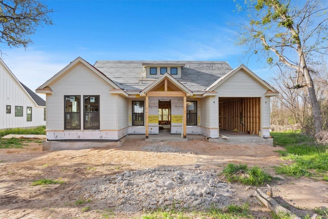 5208 Bogey Lane Waco, TX 76708 - Photo 1 of 5 a front view of a house with yard patio and outdoor seating